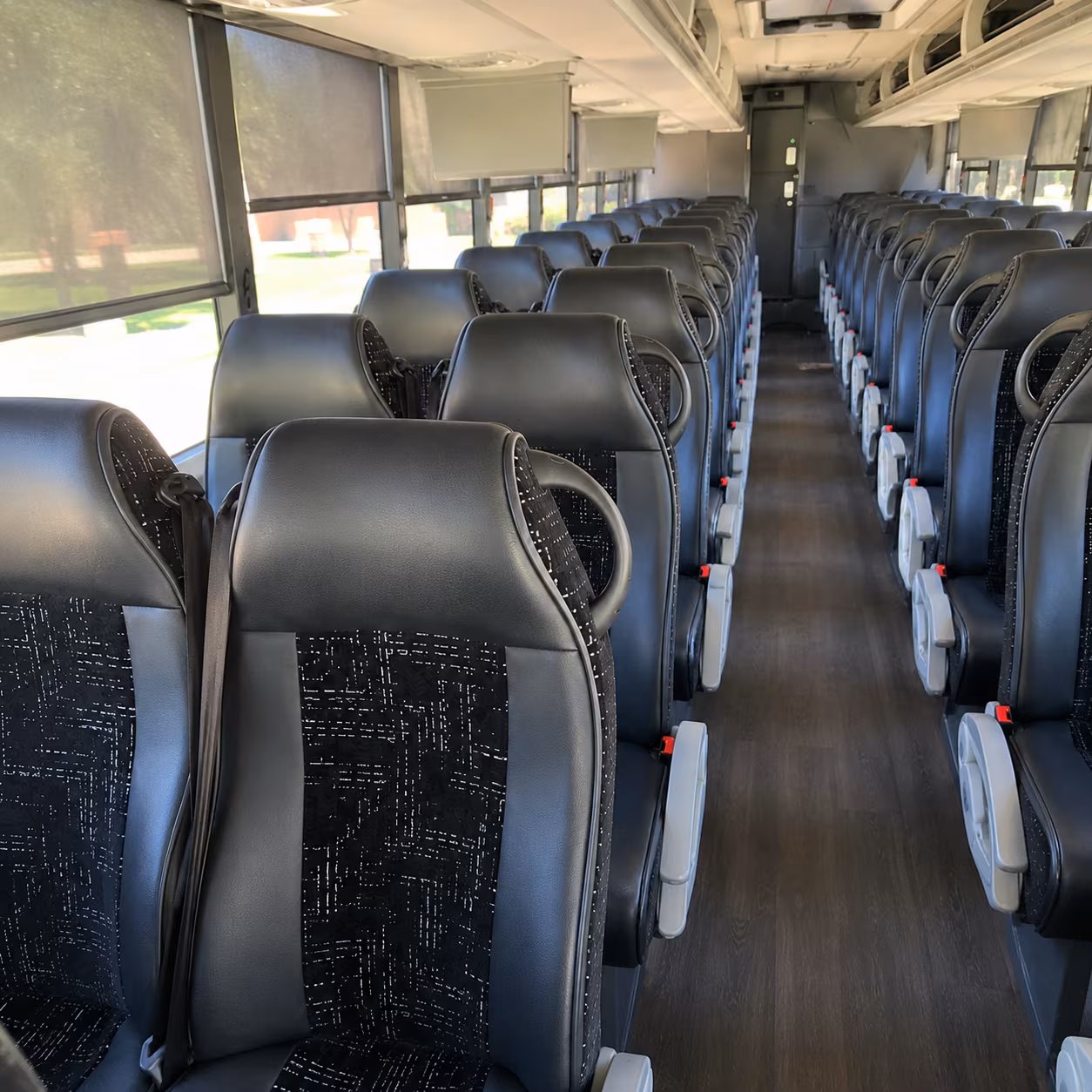 how one way transfers round trips and multi day bookings are priced for bus rentals in johns creek